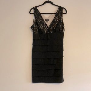 Little black dress with lace top and tummy tuck